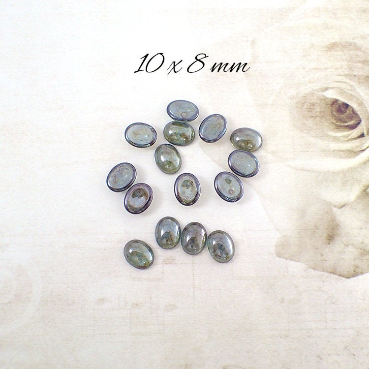 Czech Glass Cabochons - 10x8mm Oval Transparent Lumi Green Luster