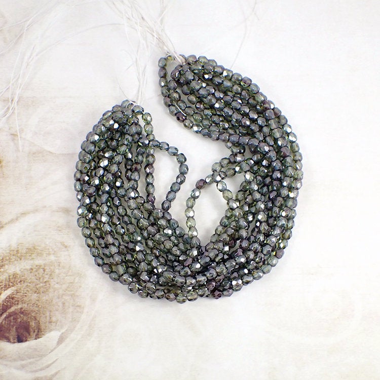 Czech Glass Beads - 4mm Fire Polished - Lumi Transparent Green Luster