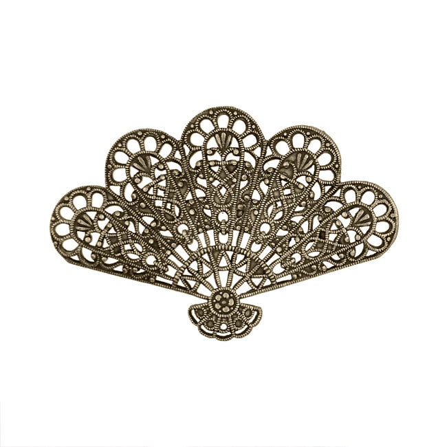 An antiqued brass fan-shaped filigree