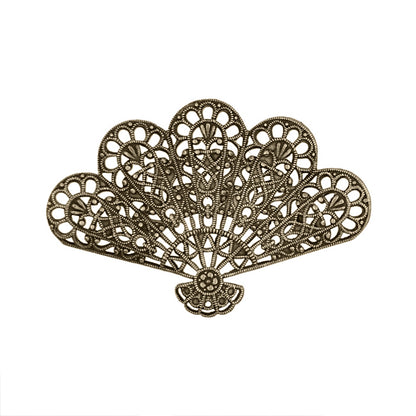 An antiqued brass fan-shaped filigree