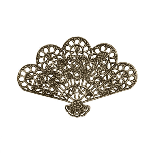 An antiqued brass fan-shaped filigree