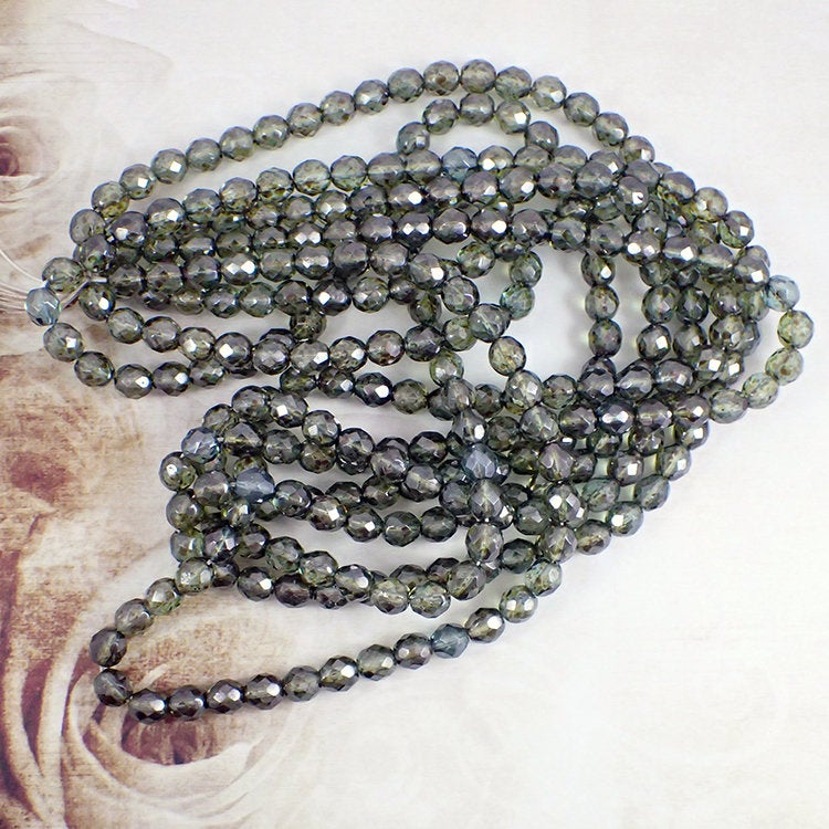 Czech Glass Beads - 8mm Fire Polished Lumi Transparent Green Luster